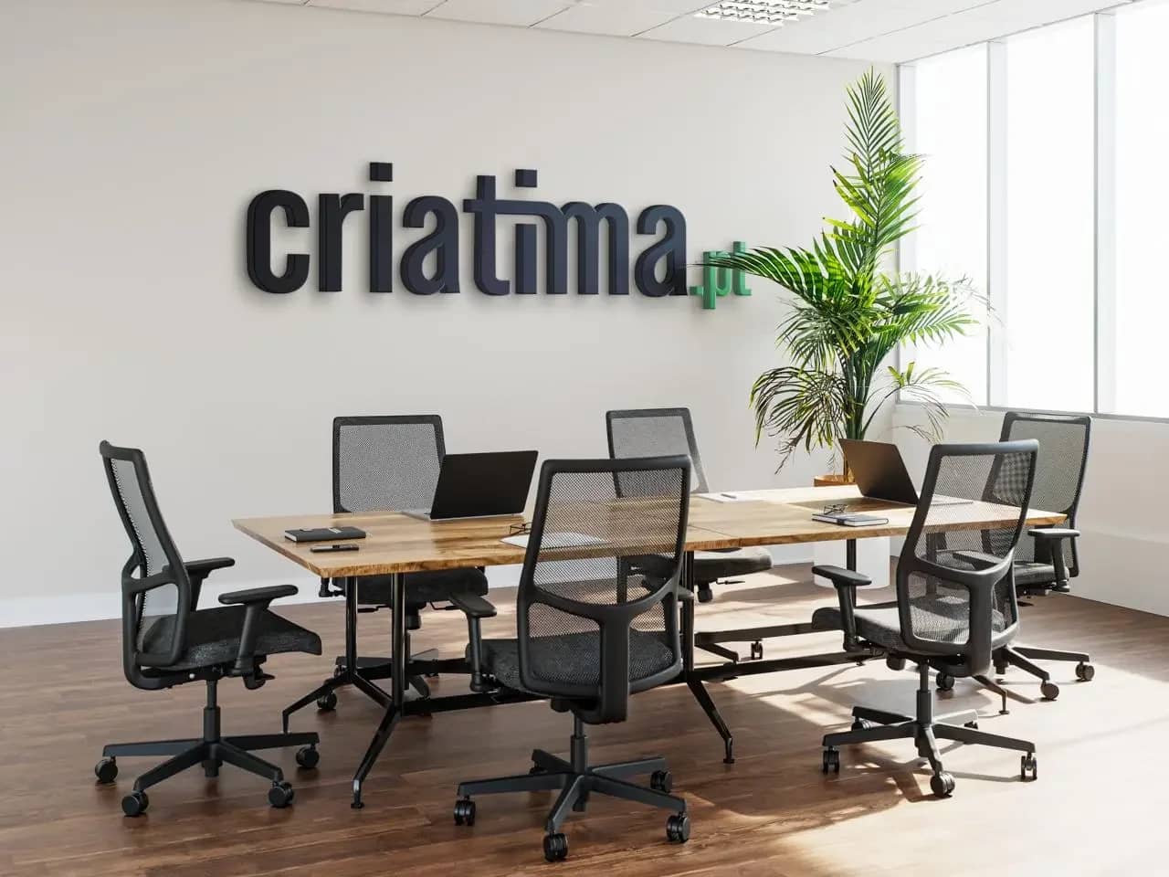 Criatima’s meeting room in Fátima, with the criatima.pt logo on the wall